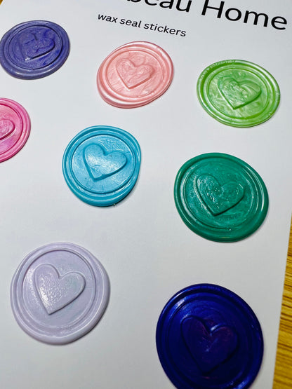 Close up view of the heart stamp in a variety of vibrant colors
