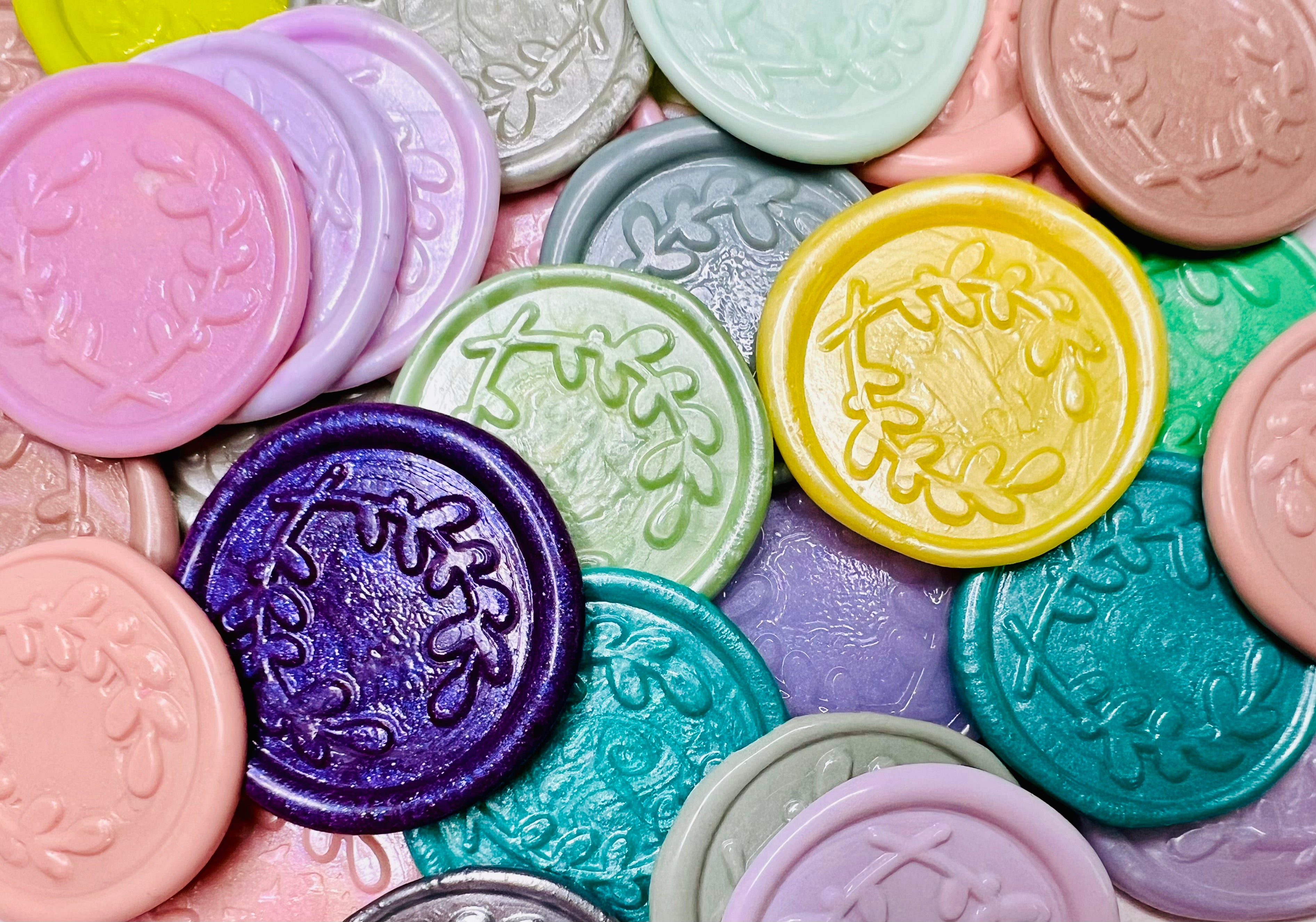 A close up view of the Olive You Always wax seal stickers in Solid Multicolor