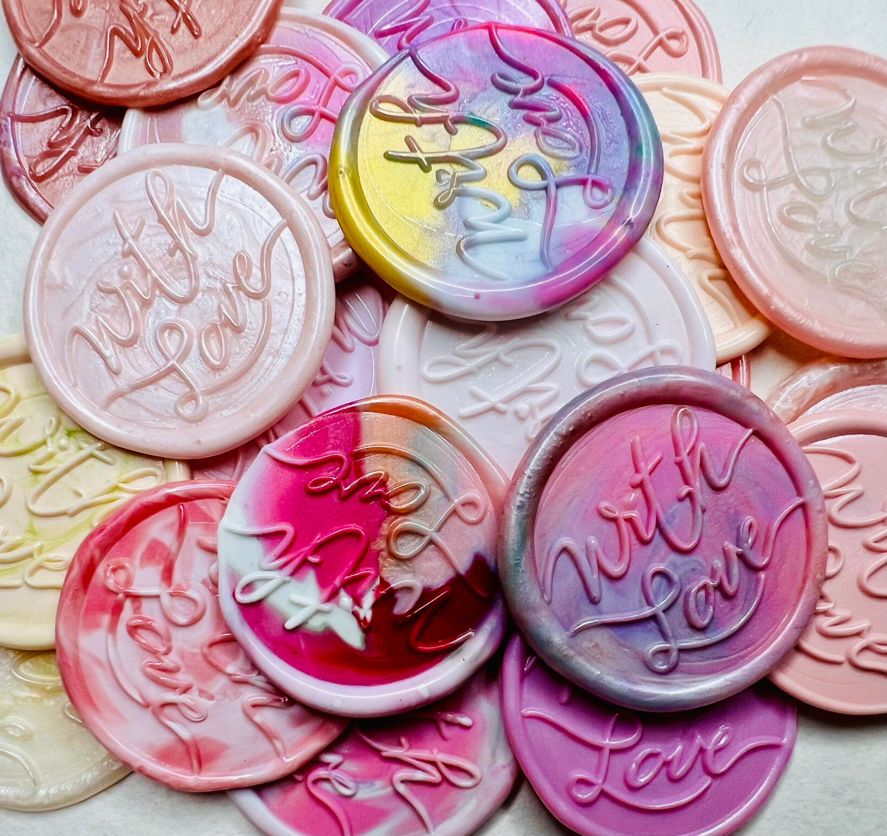 These pink-themed wax seal stickers, embossed with “With Love,” add a heartfelt touch to invitations, gifts, or snail mail. 