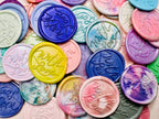A close up view of the "With Love" wax seal stickers in the Rainbow Multicolor theme