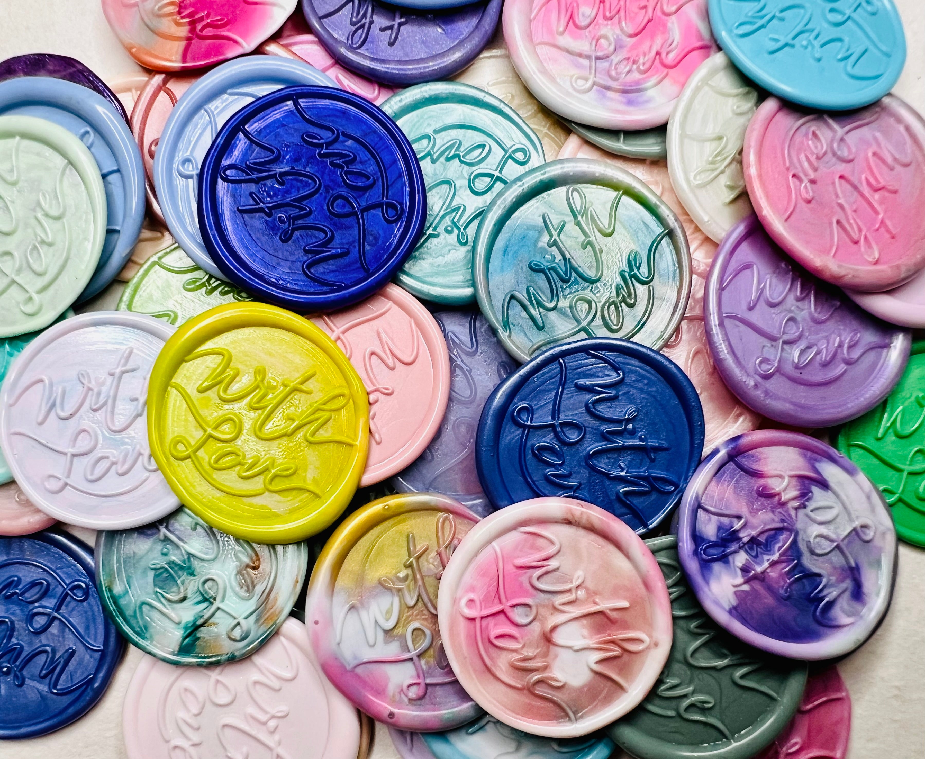 Peel-and-stick and ready to go—no melting needed. They travel well and work beautifully for craft projects, too.