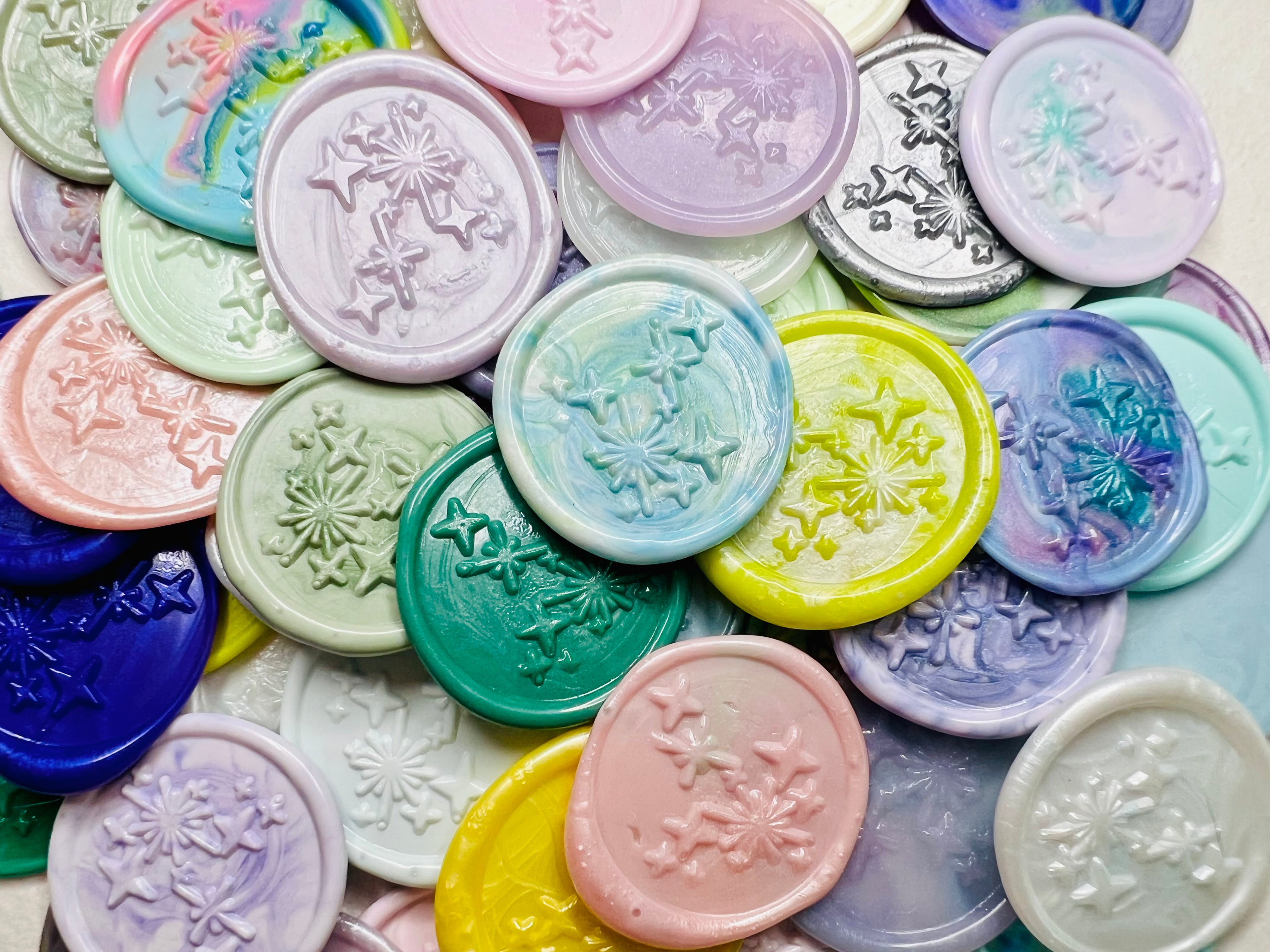 A close up view of Written in the Stars wax seal stickers