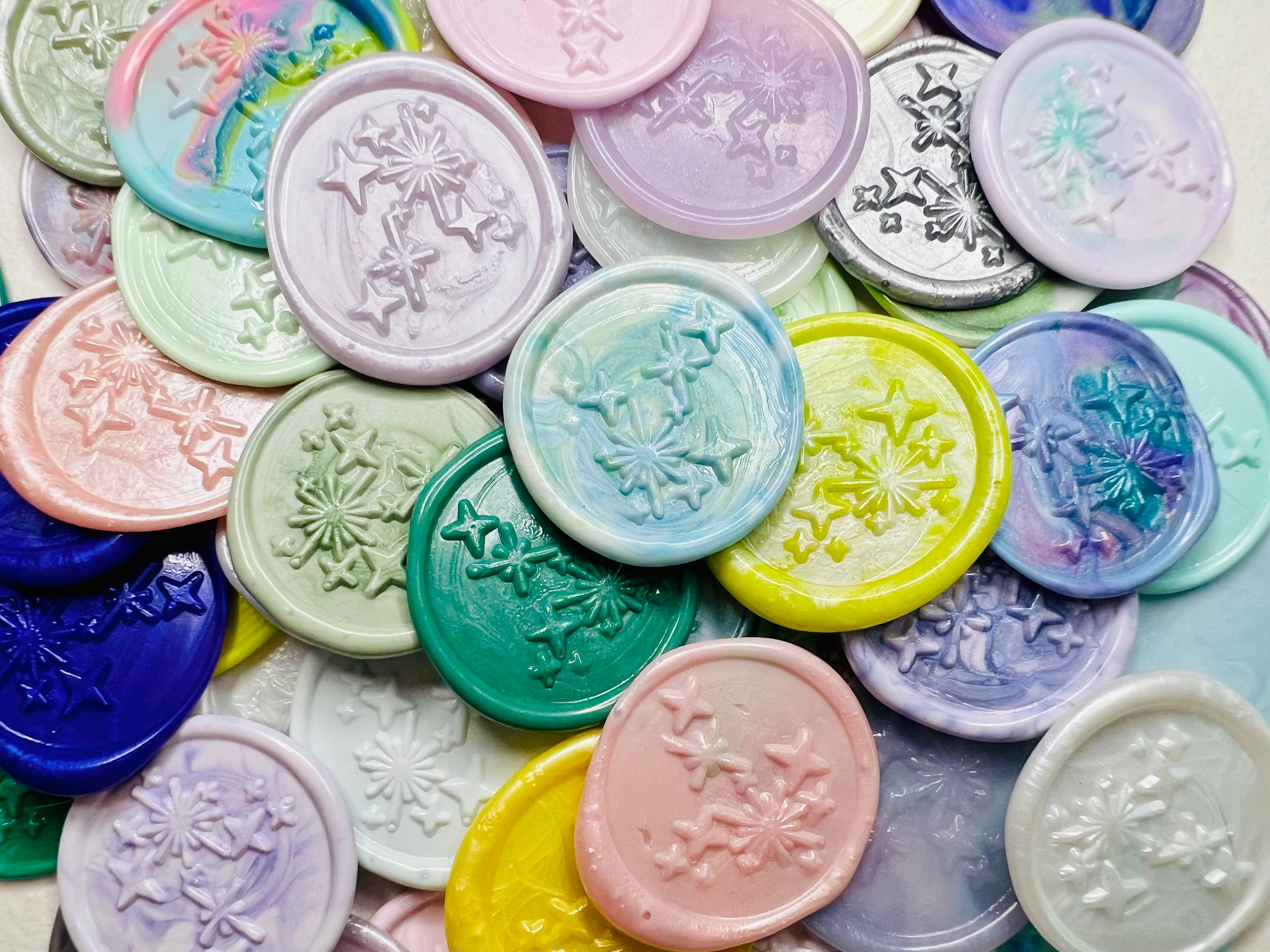 A close up view of the Written in the Stars wax seals in various colors