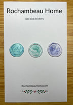 Paw print wax seal stickers in a rainbow multicolor theme