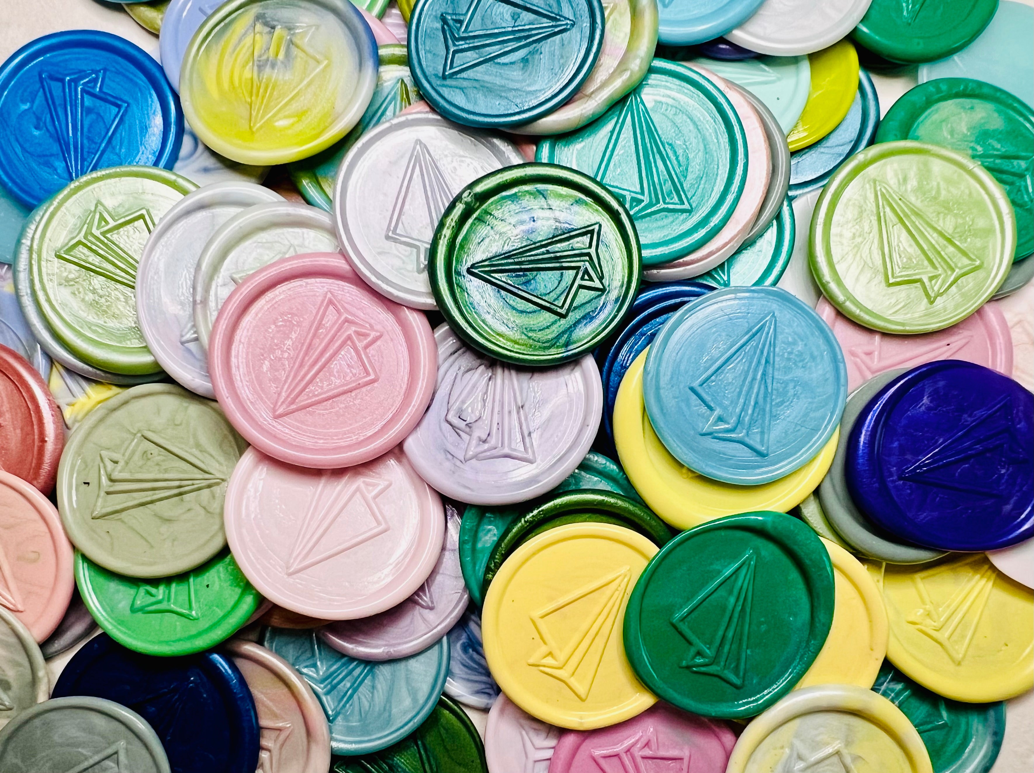 Flight of Fancy – Paper Airplane wax seal stickers in various colors and embossed with a paper airplane
