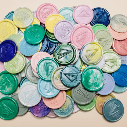 Close up view of the Flight of Fancy – Paper Airplane wax seal stickers from Rochambeau Home Gifts