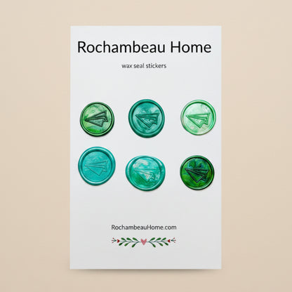 Flight of Fancy – Paper Airplane wax seal stickers created by Rochambeau Home in a green theme