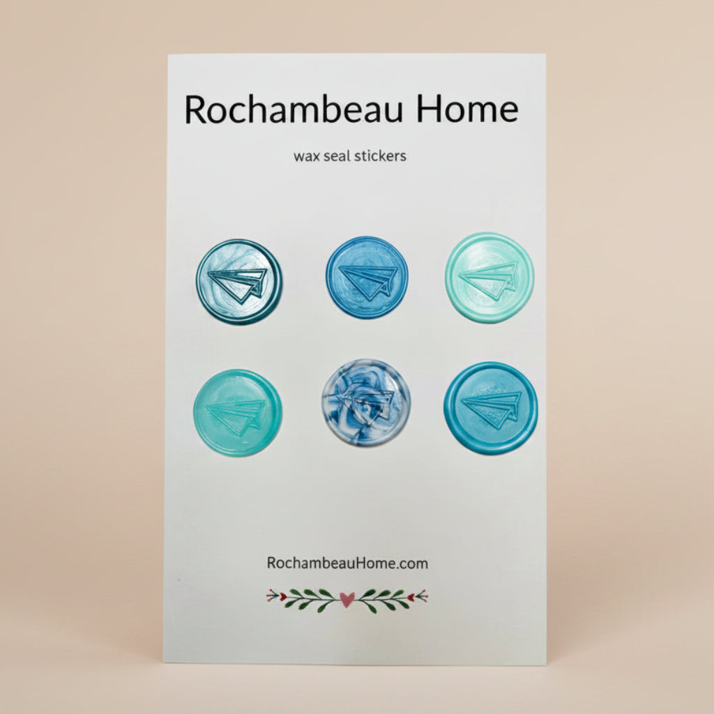 Flight of Fancy – Paper Airplane wax seal stickers created by Rochambeau Home in a blue theme