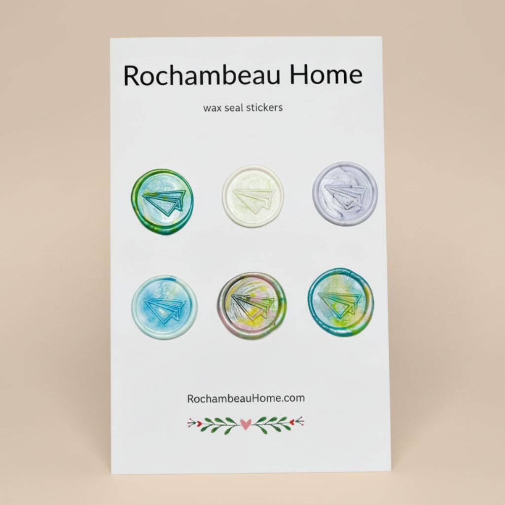 Flight of Fancy – Paper Airplane wax seal stickers created by Rochambeau Home in a rainbow multicolor theme