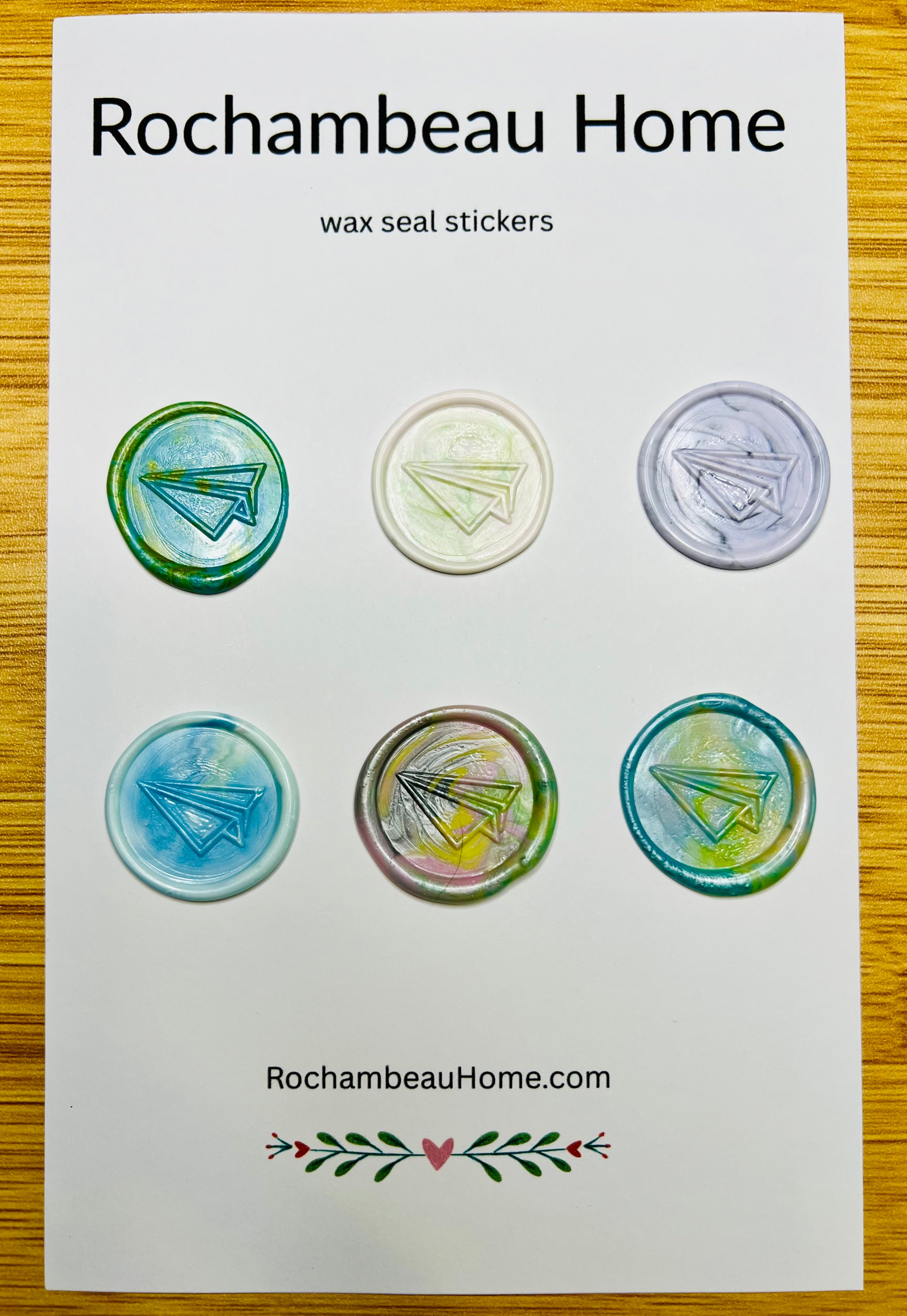 Flight of Fancy – Paper Airplane wax seal stickers in a rainbow multicolor theme
