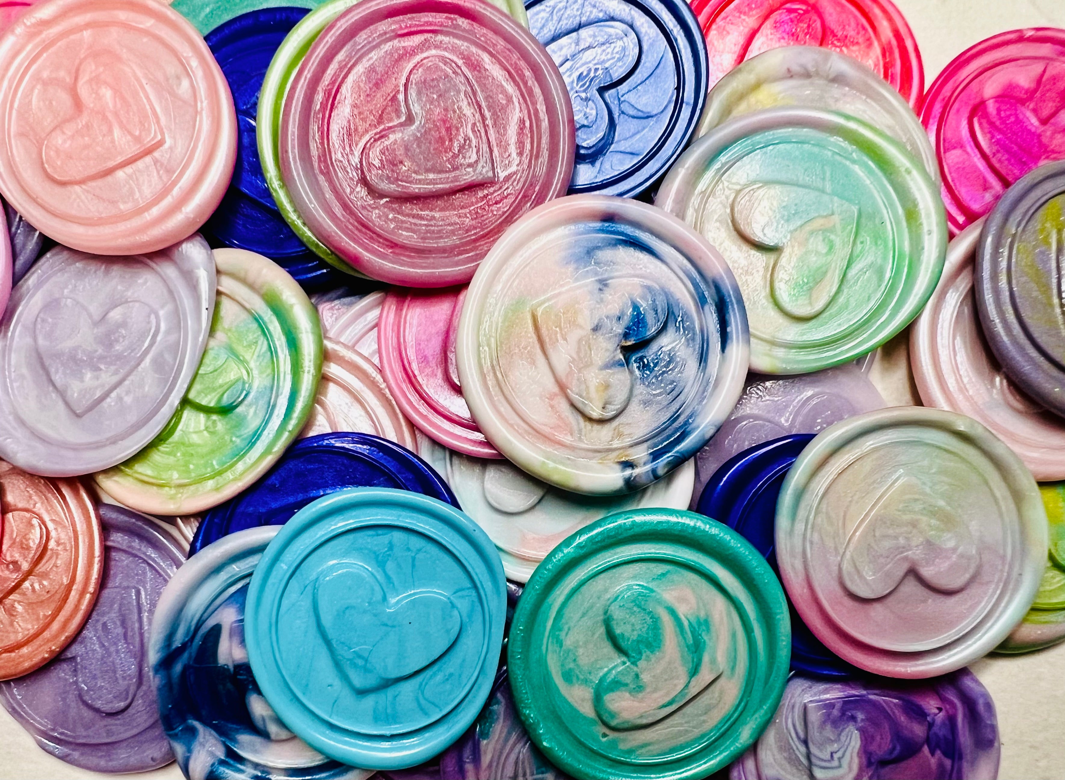 Close up view of the Sealed with Feeling – 3D Heart embossed wax seal sticker