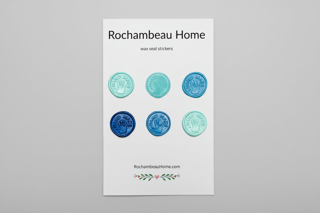 “Hand Made” wax seal stickers created by Rochambeau Home with 3D embossed handprint in a blue theme