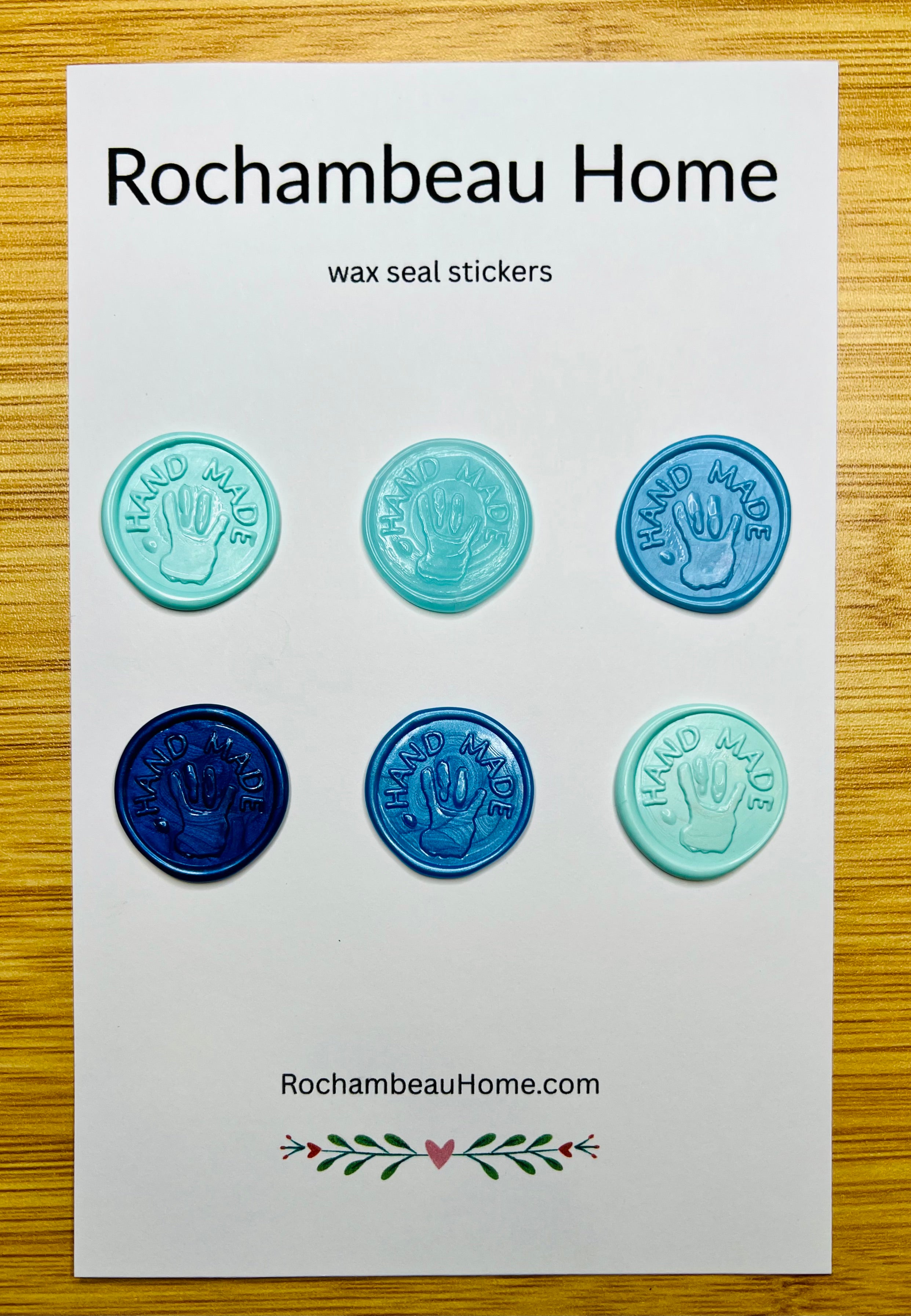 “Hand Made” wax seals with 3D embossed handprint in a blue theme