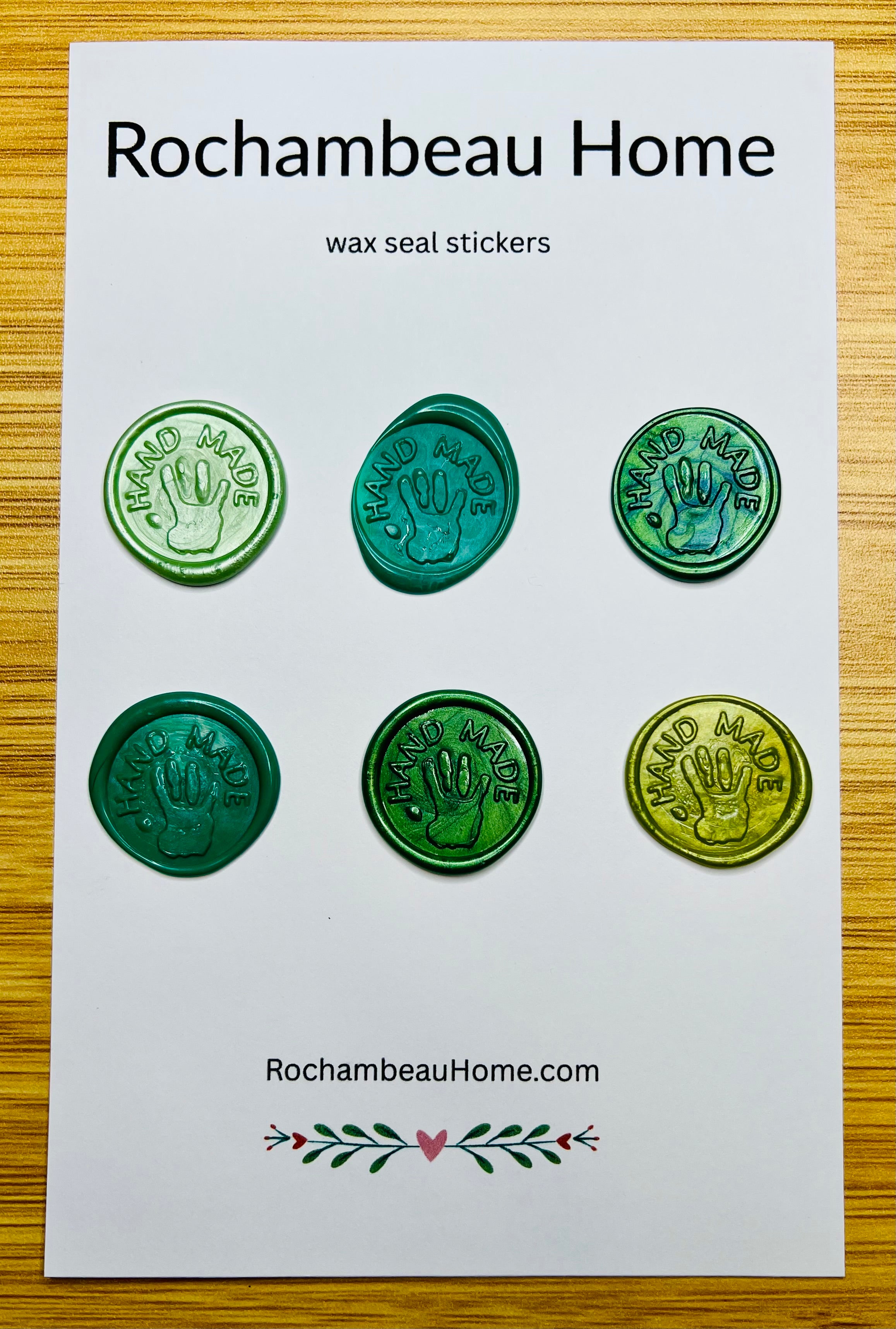 “Hand Made” wax seals with 3D embossed handprint in a green theme