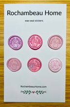 “Hand Made” wax seals with 3D embossed handprint in a pink theme