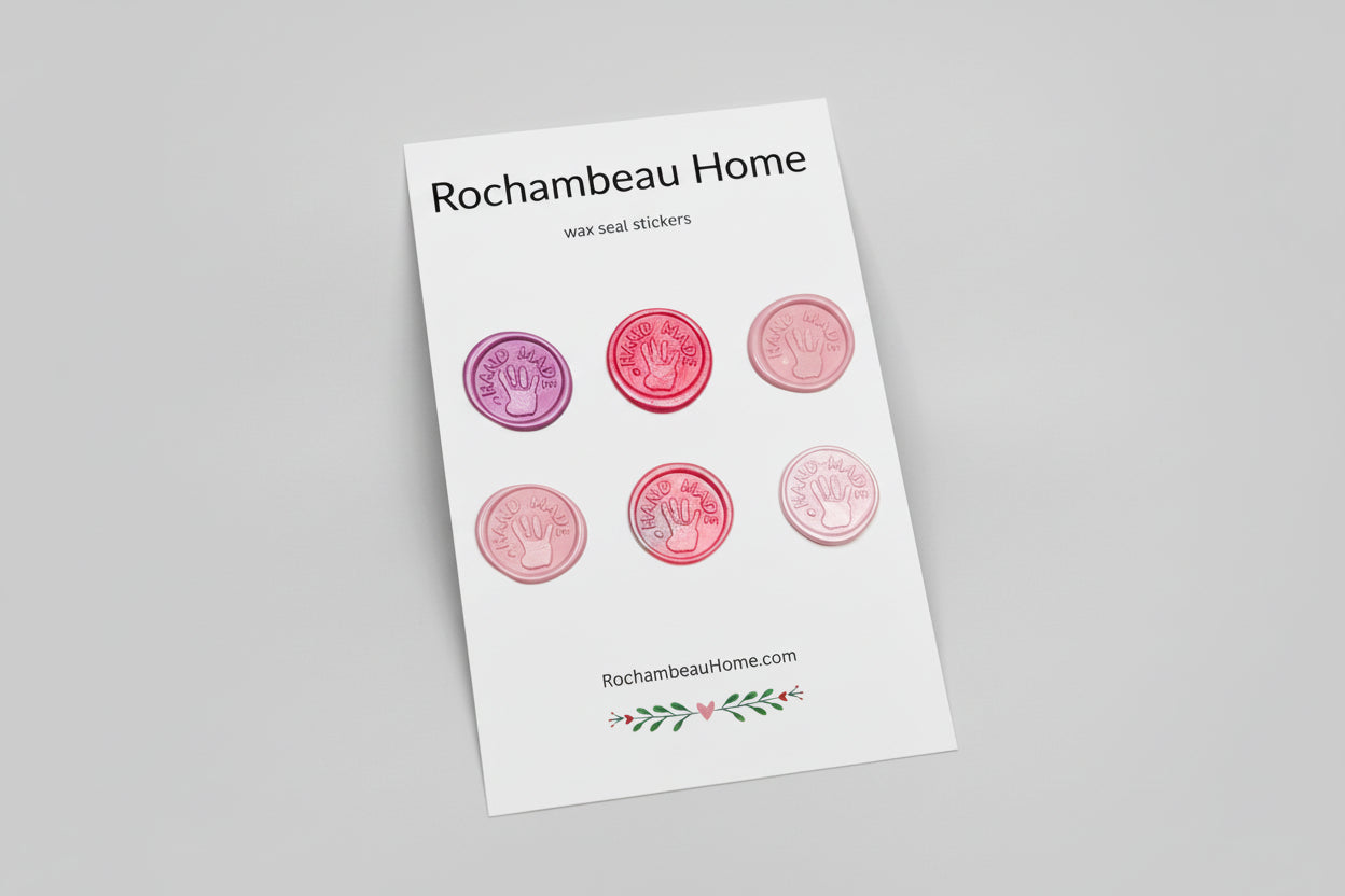 “Hand Made” wax seal stickers created by Rochambeau Home with 3D embossed handprint in a pink theme
