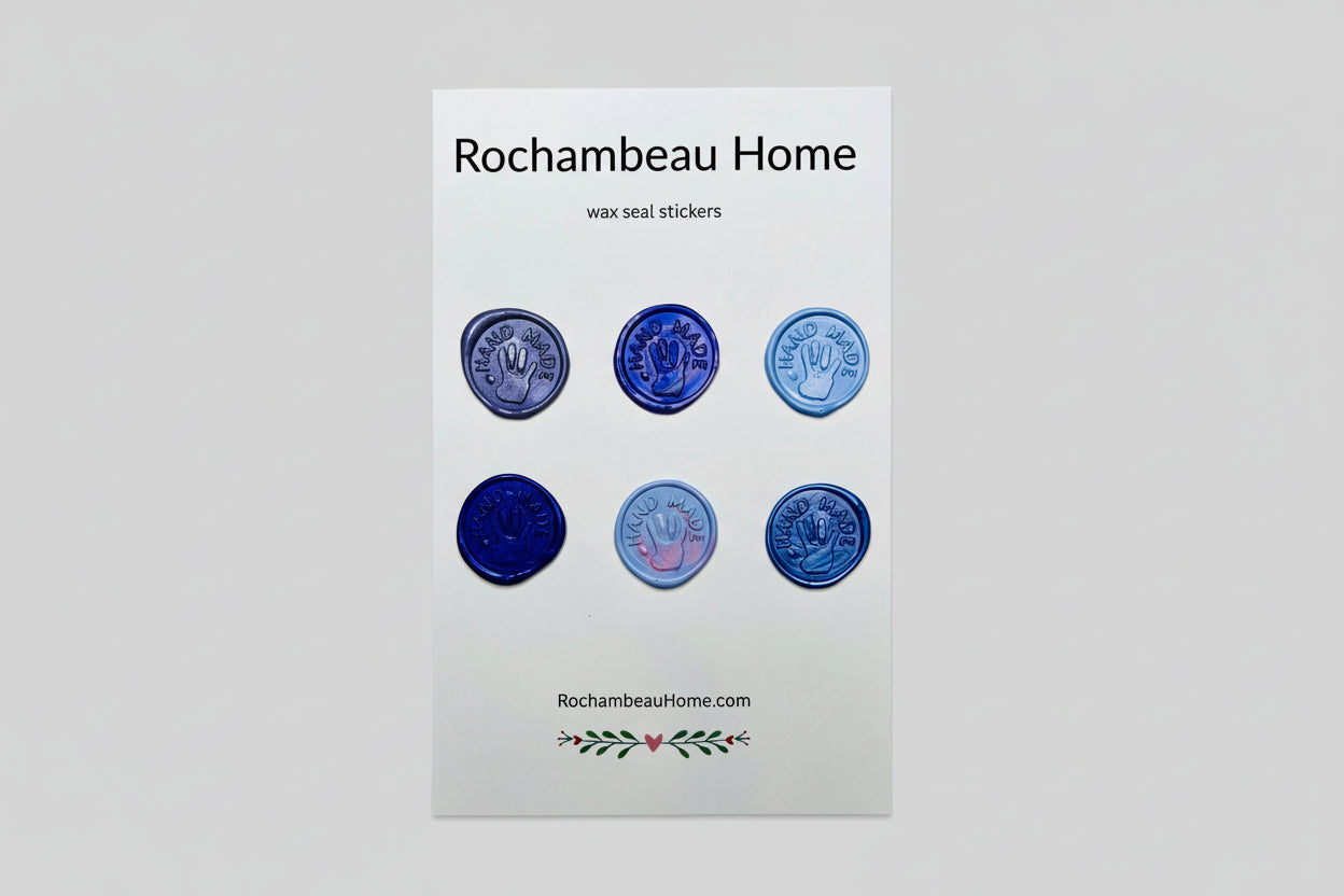 “Hand Made” wax seal stickers created by Rochambeau Home with 3D embossed handprint in a blue theme