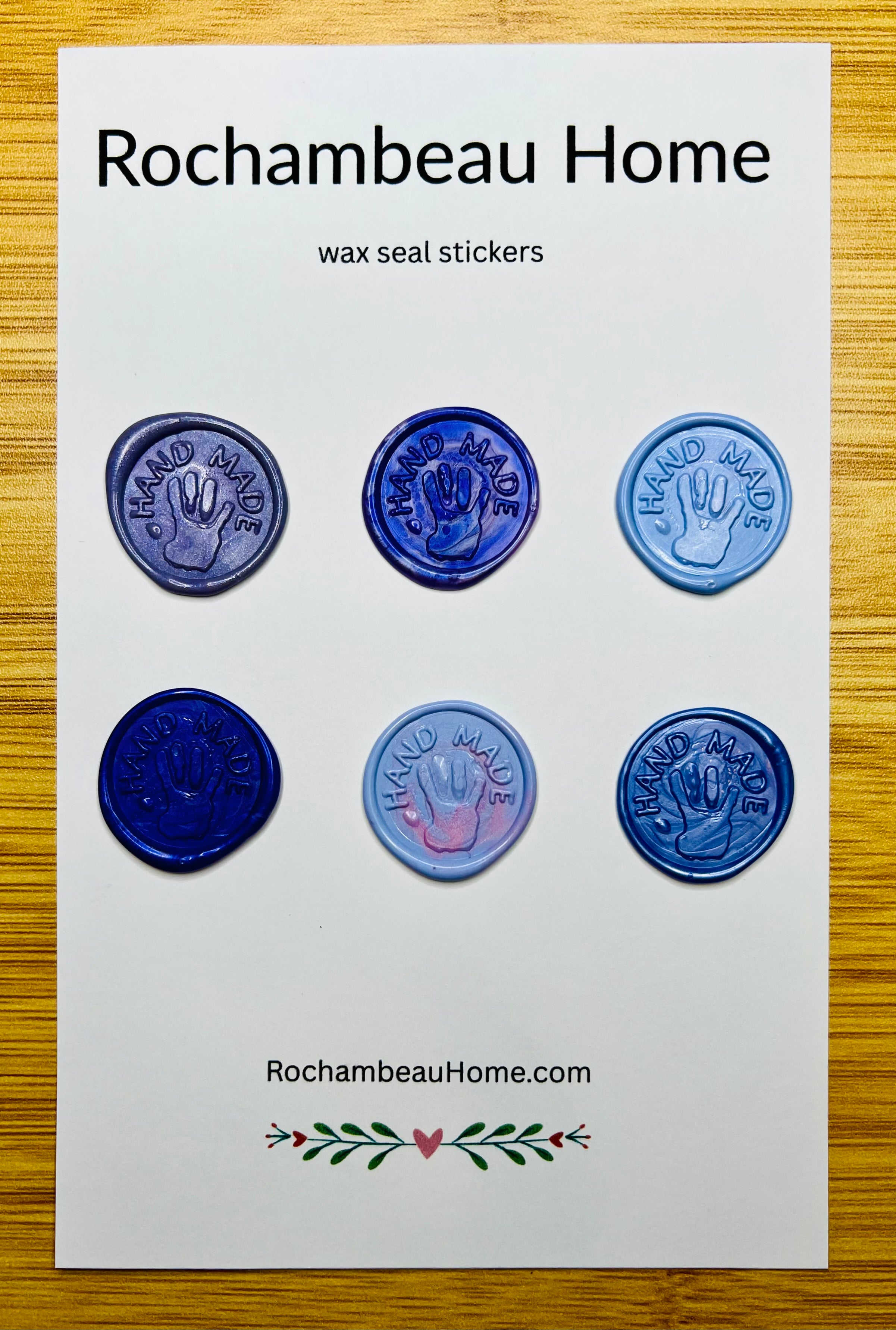 “Hand Made” wax seals with 3D embossed handprint in a blue theme