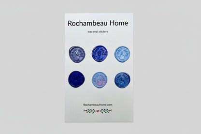 “Hand Made” wax seal stickers created by Rochambeau Home with 3D embossed handprint in a blue theme