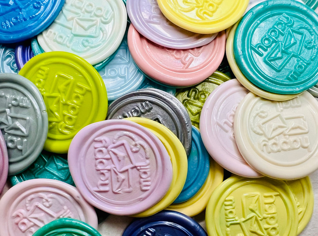 Close up view of "Happy Mail" embossed wax seal stickers