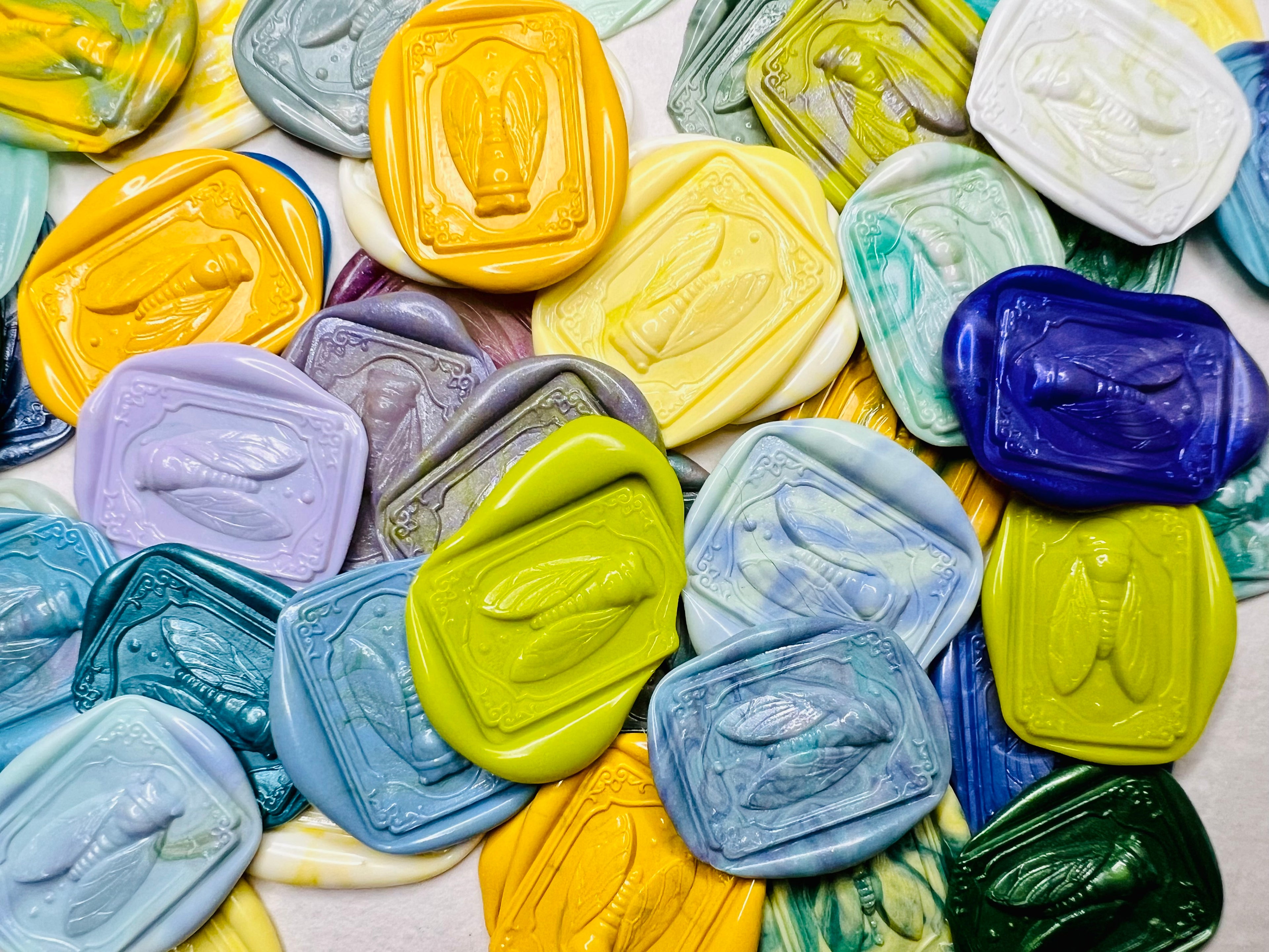 Oddity-themed cicada wax stickers with elegant vintage-style edging