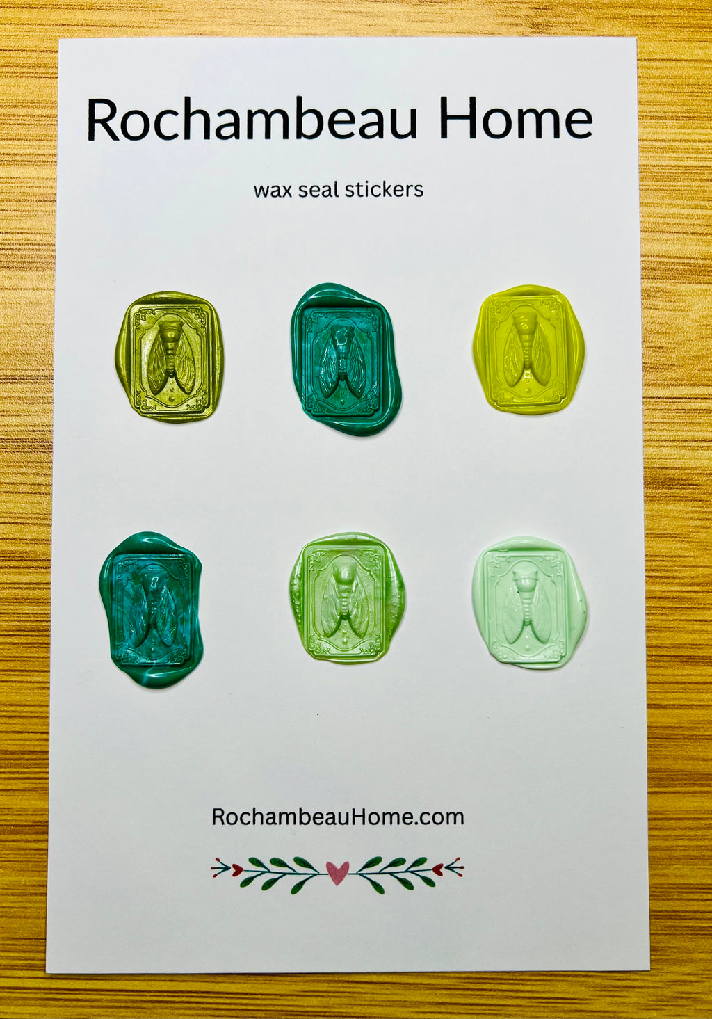Intricate cicada wax seal stickers in a green theme