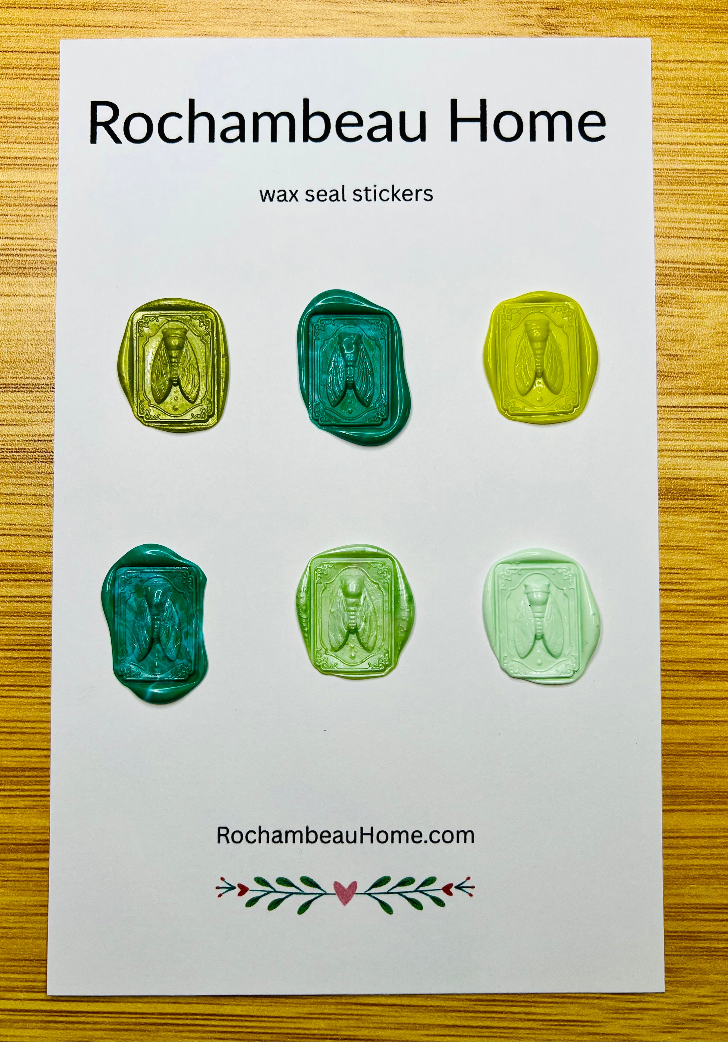 Intricate cicada wax seal stickers in a green theme