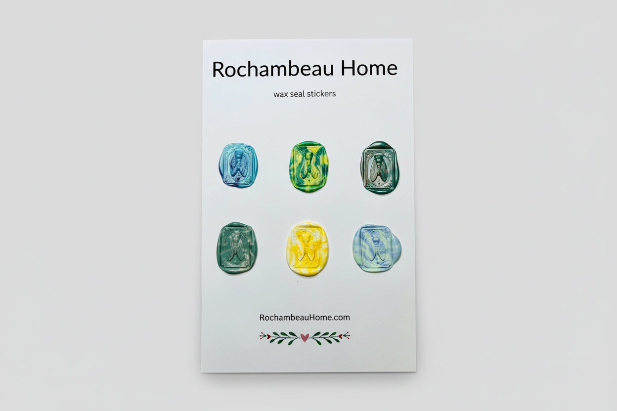 Intricate cicada wax seal stickers created by Rochambeau Home in a rainbow multicolor theme
