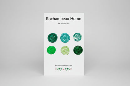 Set of green wax seal stickers on a white card with 'Rochambeau Home' branding.