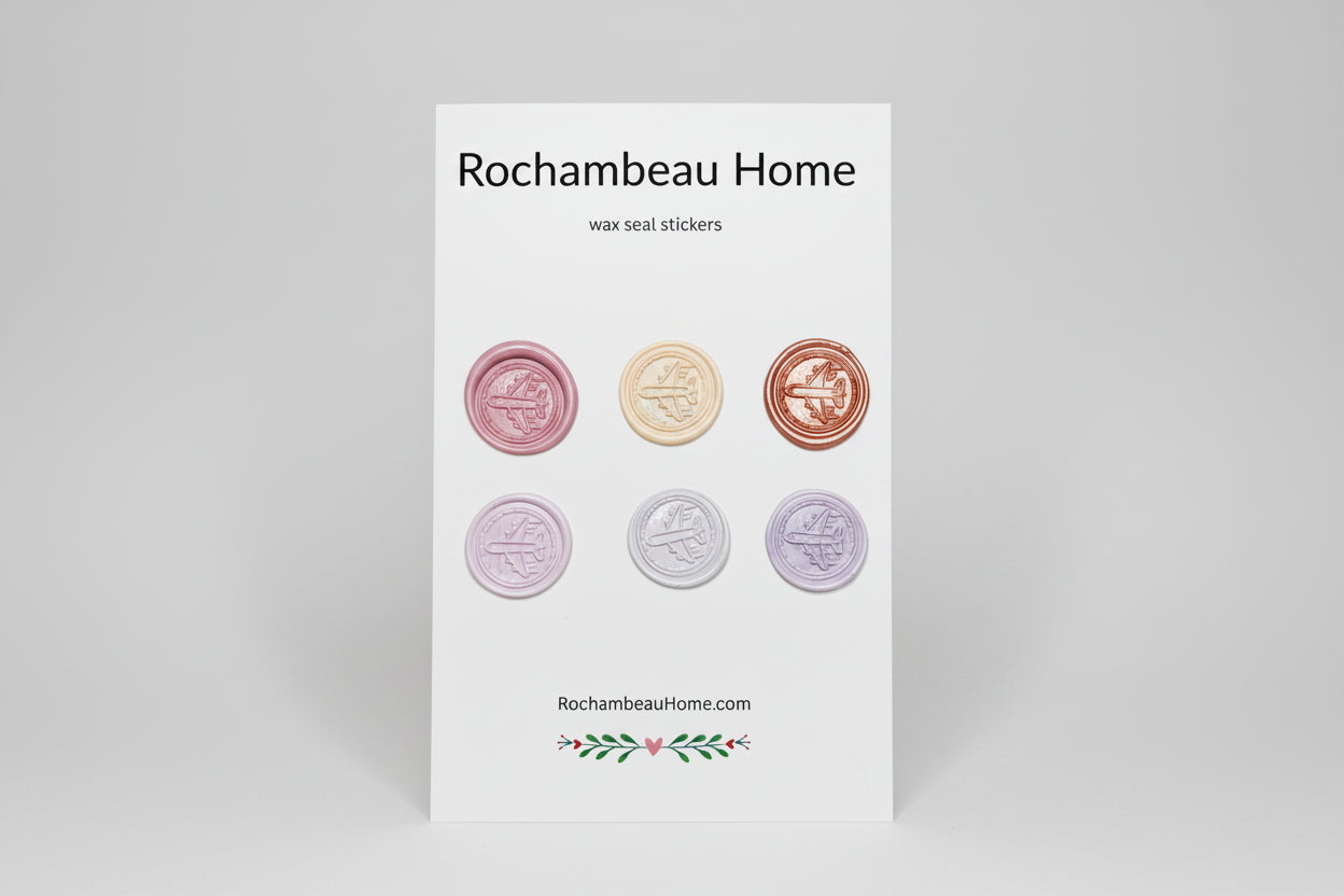 Vintage-Inspired Airplane wax seal stickers created by Rochambeau Home in a pink theme