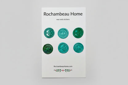 Mix of Airplane embossed wax seal stickers created by Rochambeau Home in a green theme.