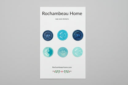 Mix of airplane embossed wax seal stickers created by Rochambeau Home in a blue theme.