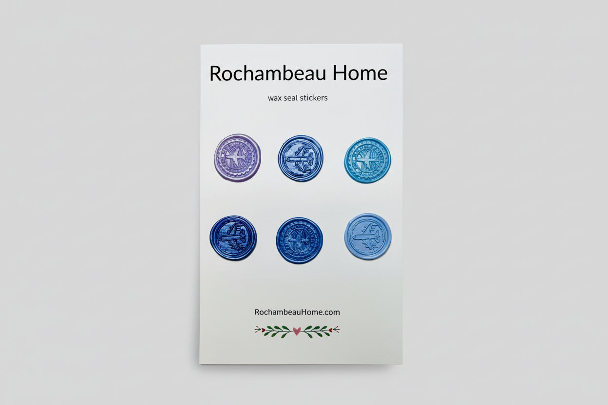 Mix of airplane embossed wax seal stickers created by Rochambeau Home in a purple theme.