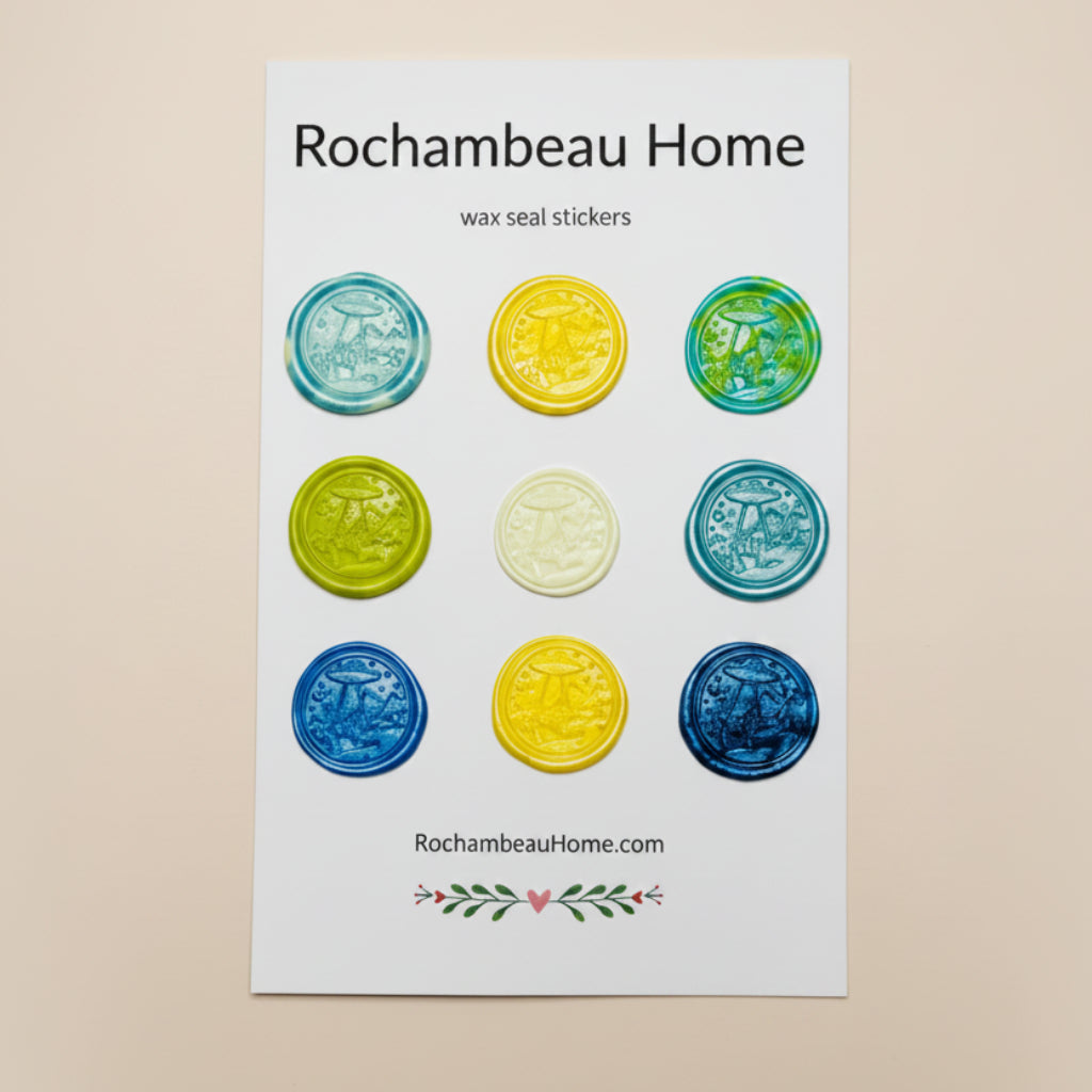 Set of wax seal stickers by Rochambeau Home on a white card on a gray background.