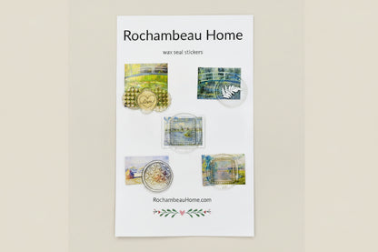 Close-up of a handcrafted wax seal stickers created by Rochambeau Home with gold and silver accents over an impressionist landscape (Art Deco 002)