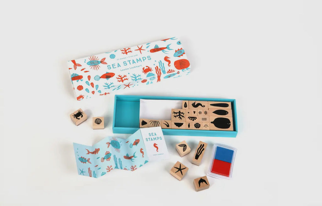 Assorted ocean-inspired stamps laid out, showcasing whimsical marine designs