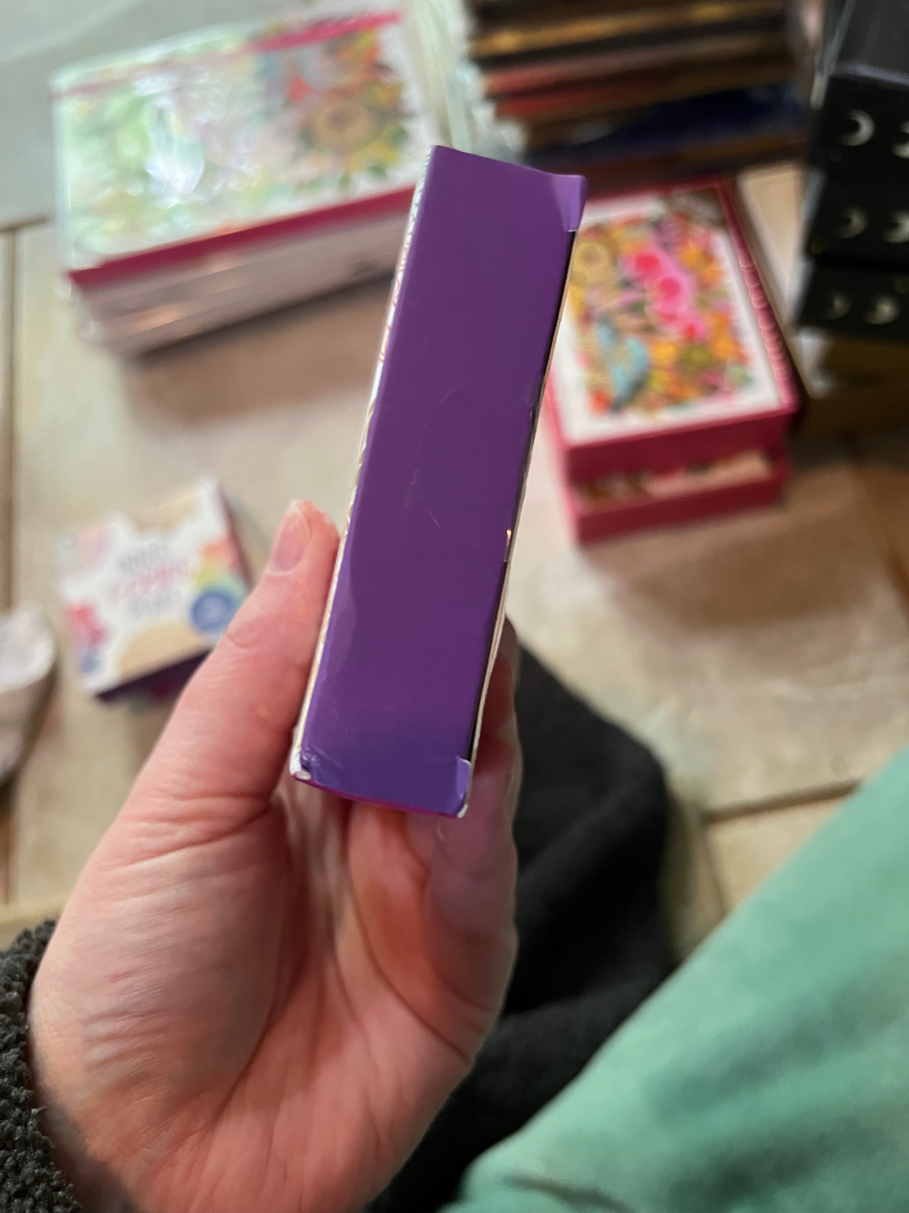 Another box with denting and tears around the opening