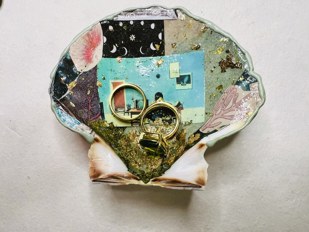 Abstract trinket dish with glitter, waxed edges, and cosmic theme