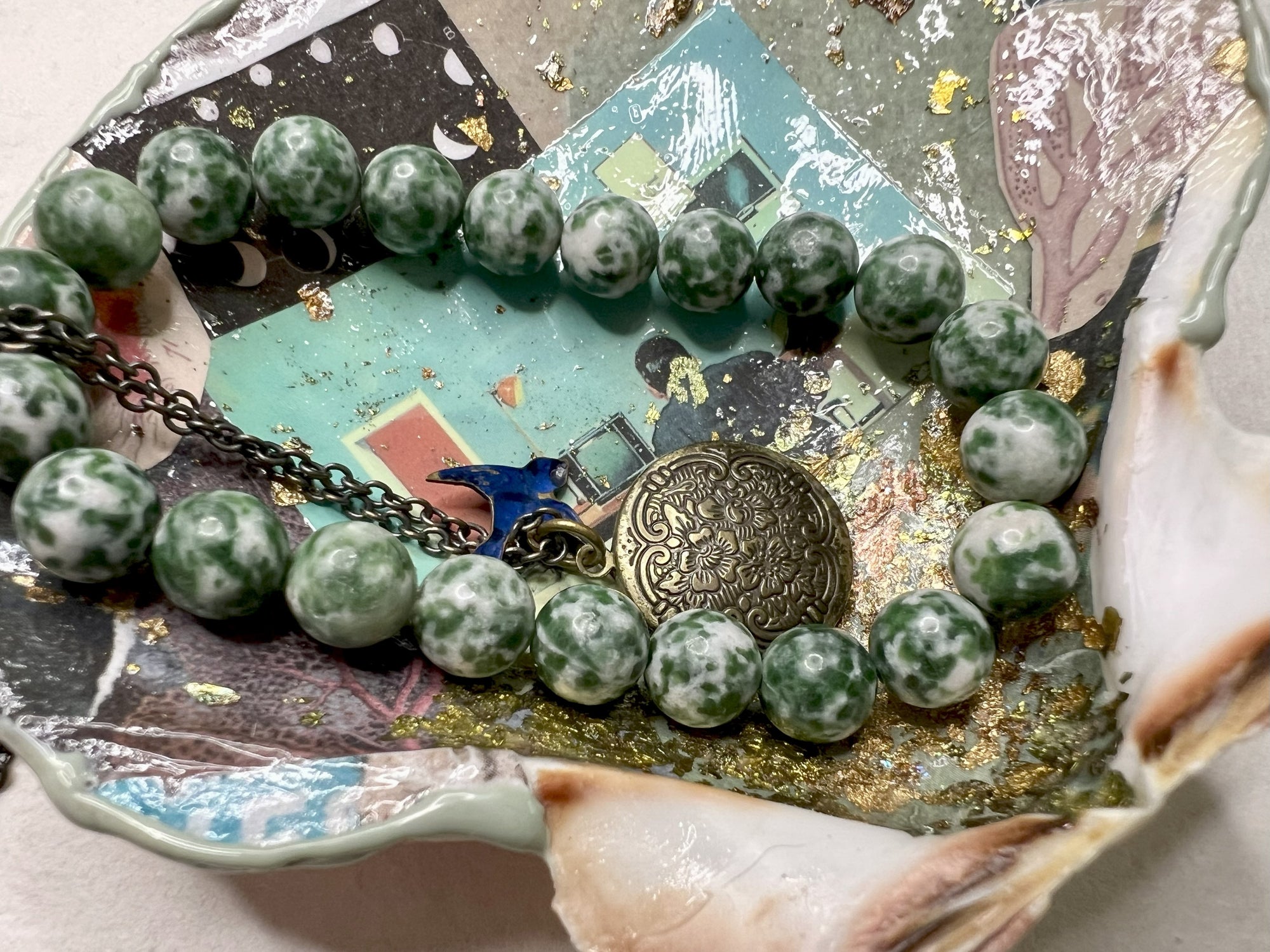 Mixed media shell tray with celestial and botanical imagery