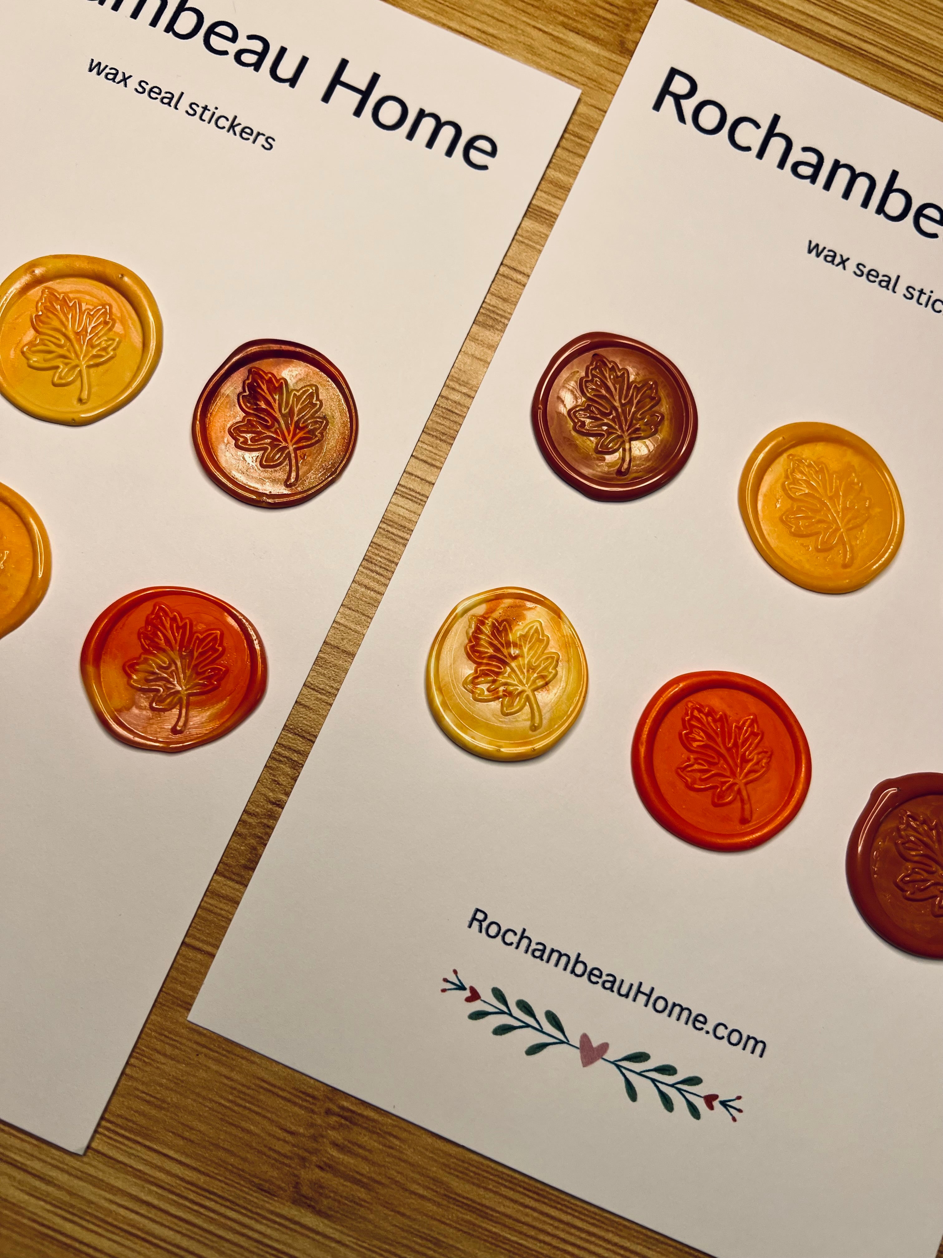 Wax seal stickers by Rochambeau Home on branded cards with website information.