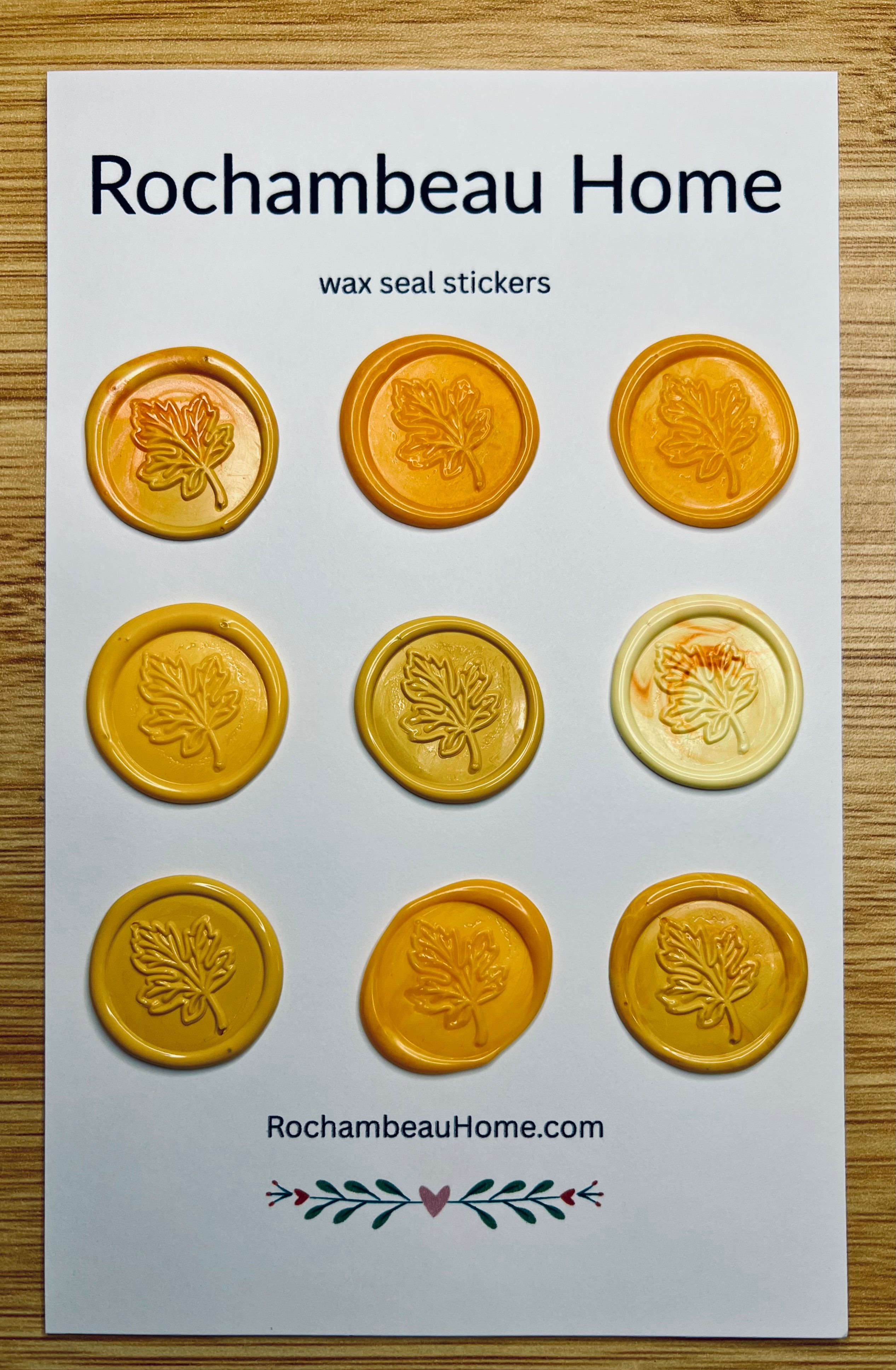9 pack card of yellow Falling for You Maple Leaf Wax Seal Stickers on a Rochambeau Home display card