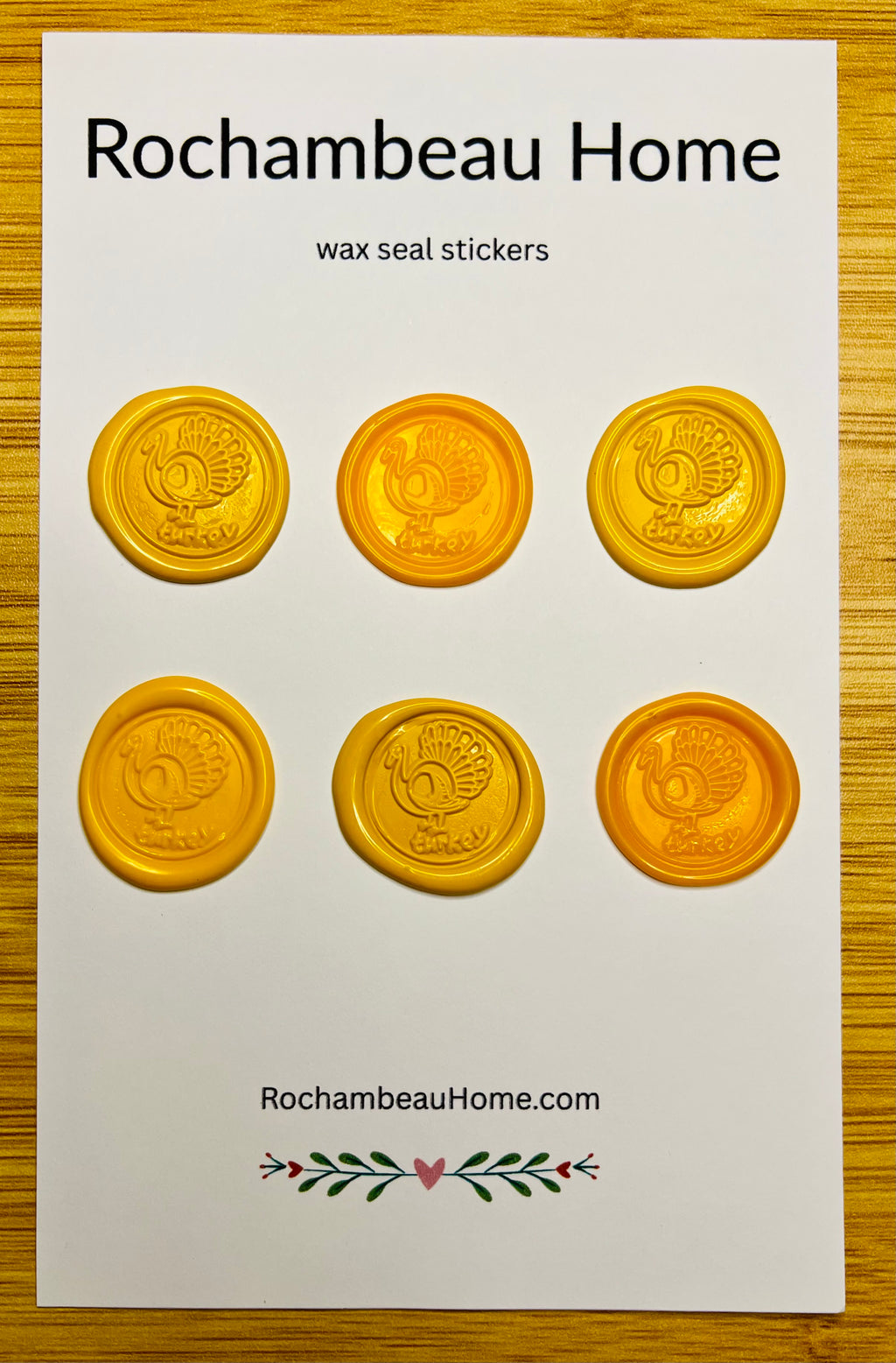 Set of six yellow Gobble & Glow wax seal stickers on a white card with 'Rochambeau Home' branding.