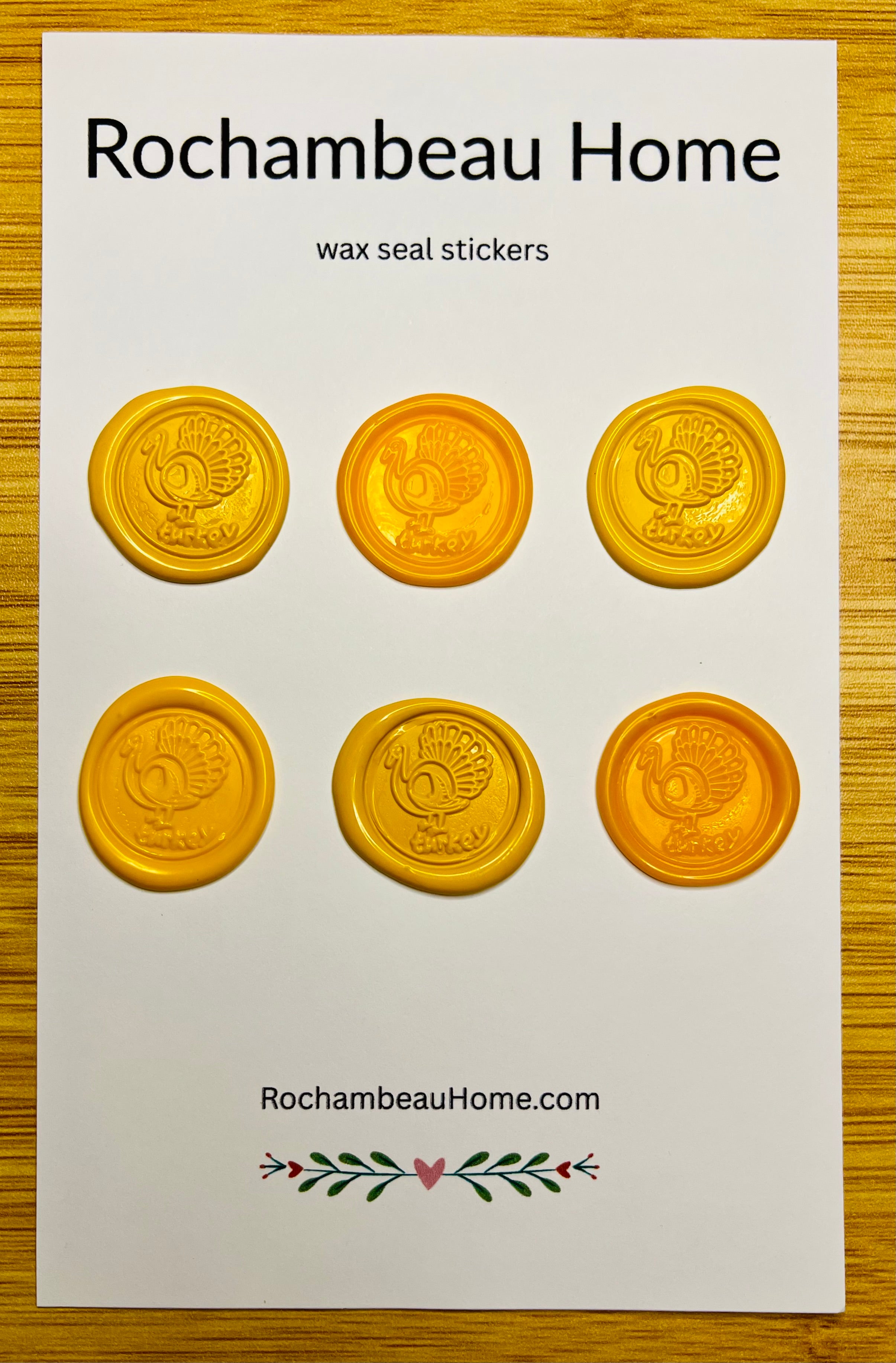 Set of six yellow Gobble & Glow wax seal stickers on a white card with 'Rochambeau Home' branding.