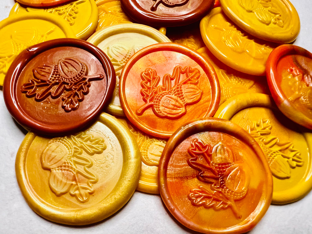 Close up view of the Golden Harvest Oak Leaf & Acorn Wax Seal Stickers showcasing the embossed oak leaf and acorns