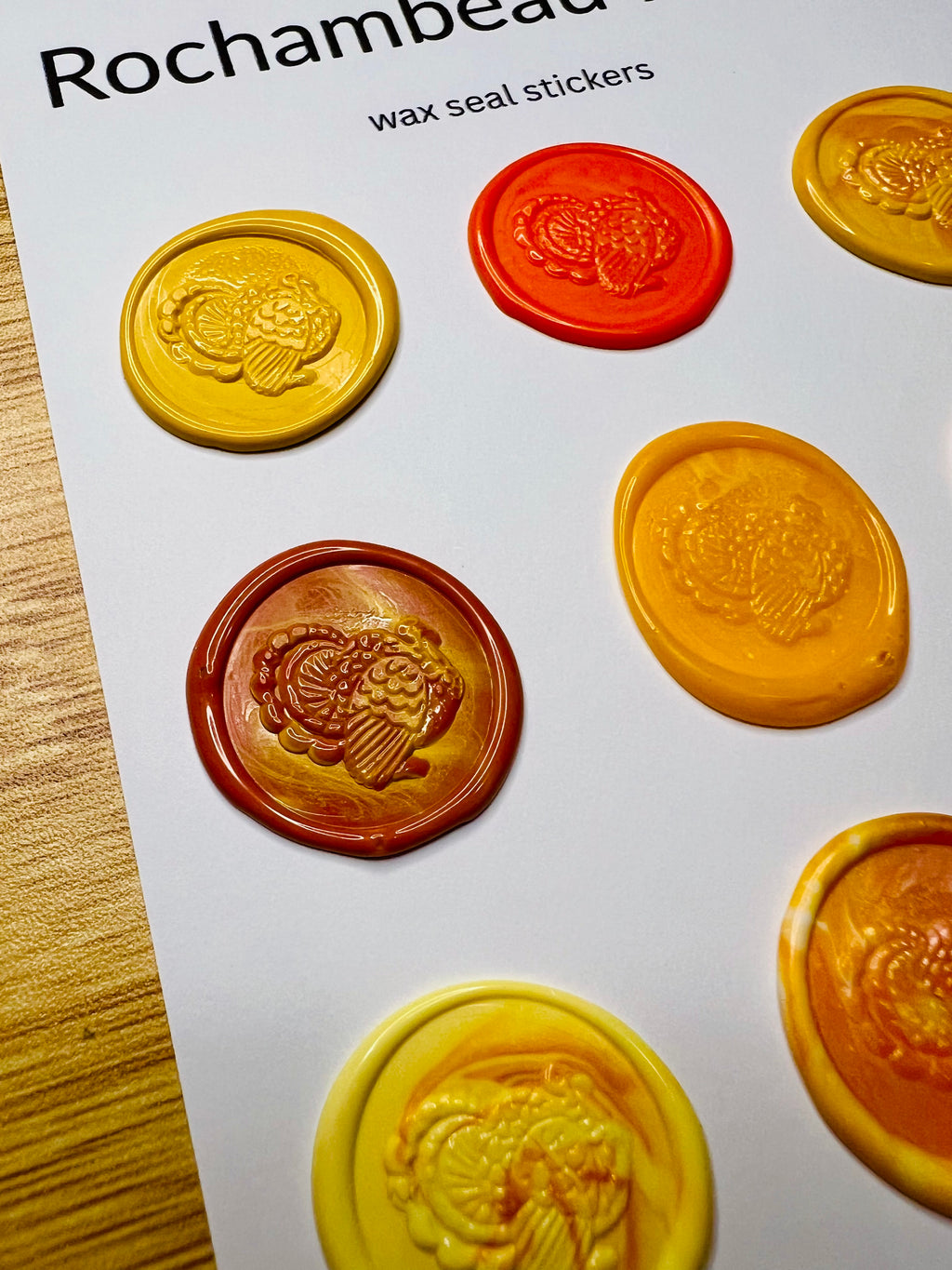 Close up view of the Festive Turkey Wax Seal Stickers in various orange and yellow tones