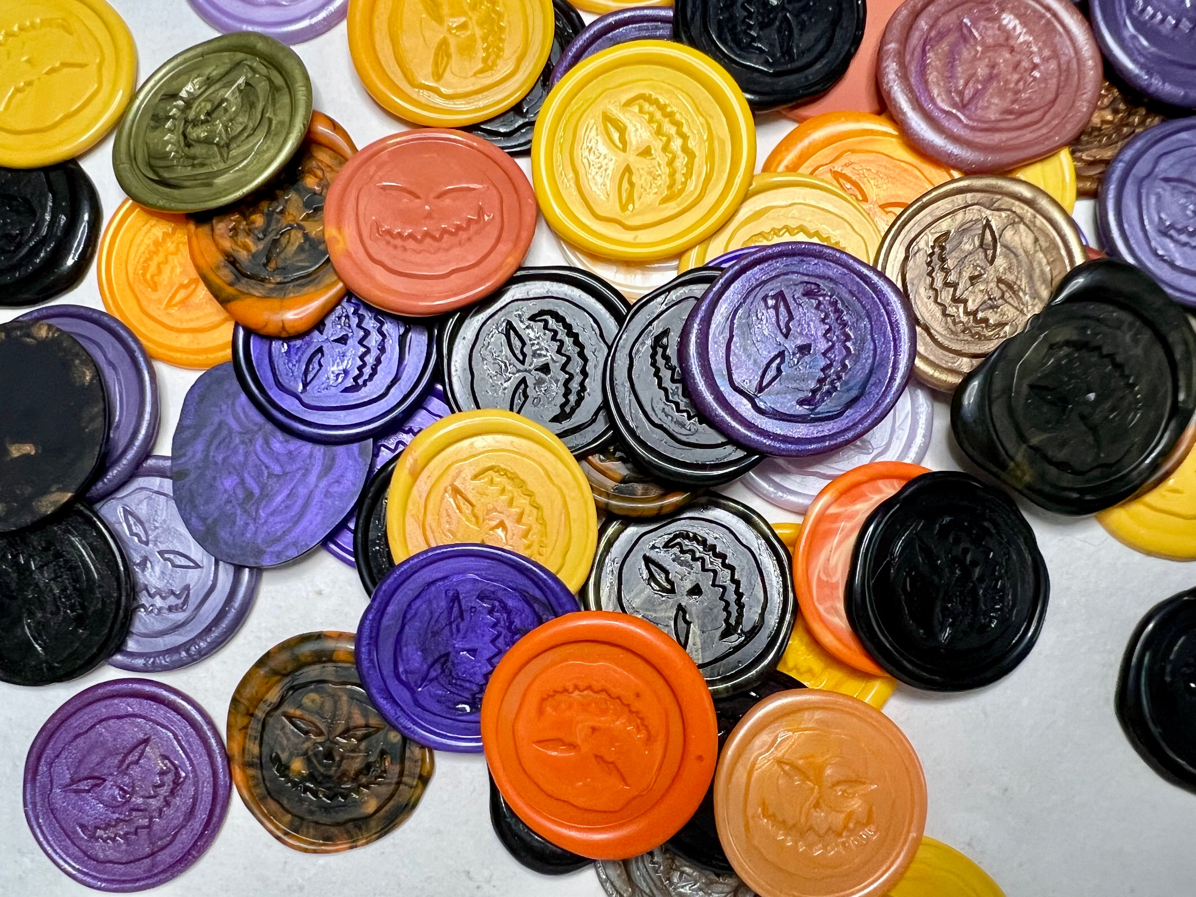 Assorted Angry Pumpkin wax seal stickers various designs on a white background