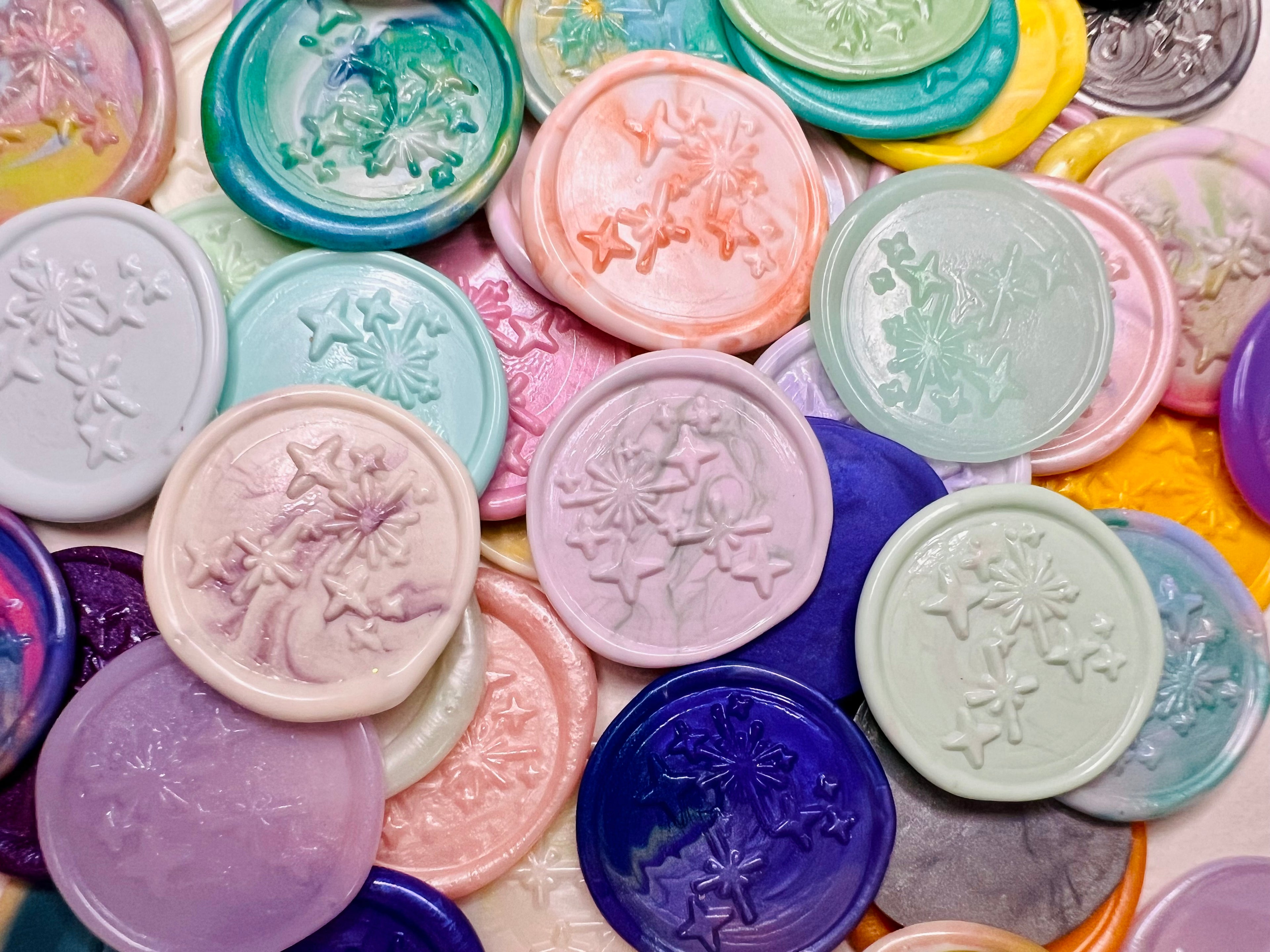 Assortment of 6 Pack Card of the Bright Star Constellation Wax Seal Stickers on top of natural handmade paper