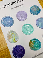 A side angle view of the Heart & Hand Wax Seal Stickers in bright and vibrant colors