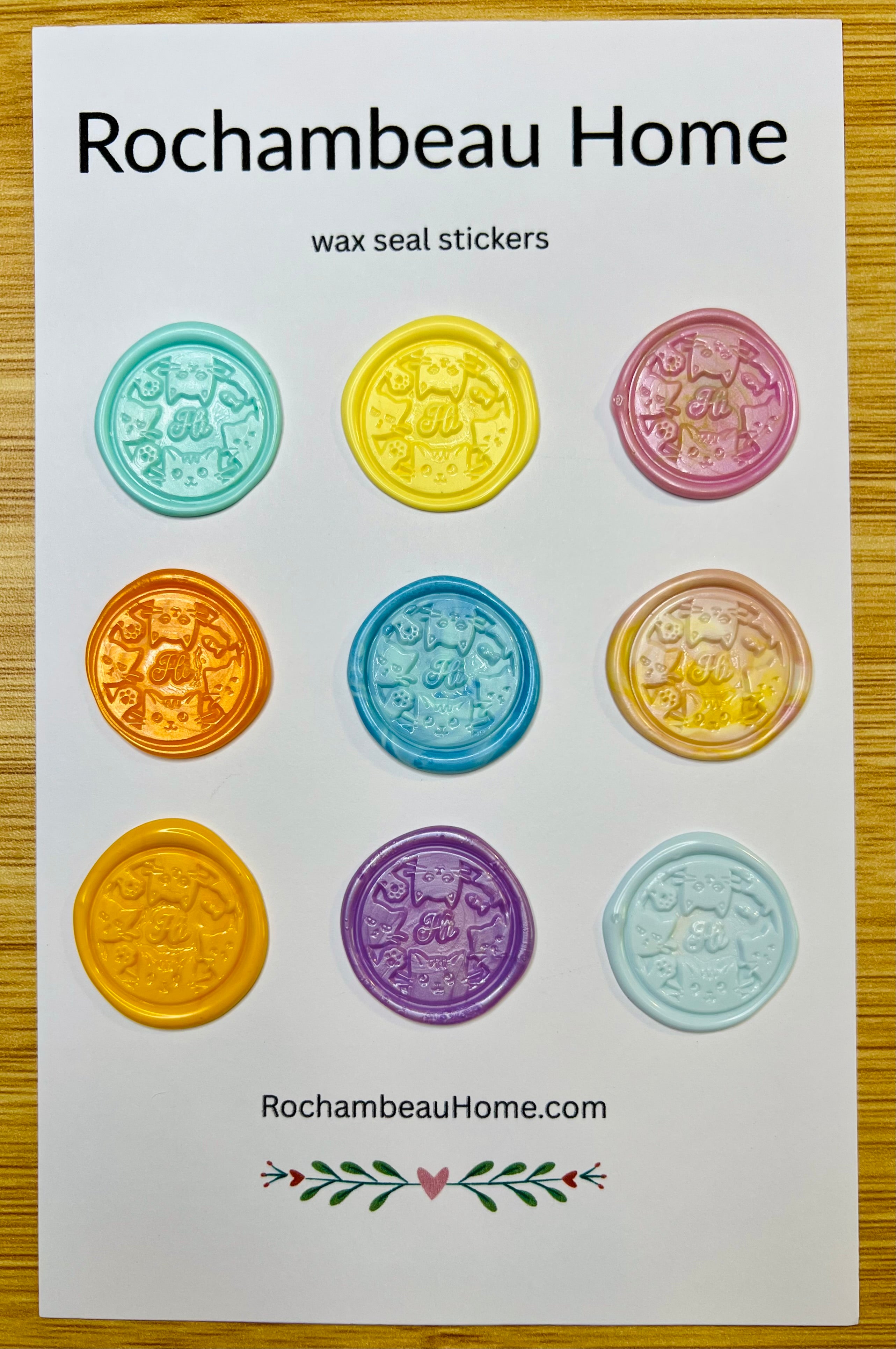 9 Pack Card of Hi Kitty Wax Seal Stickers in various colors on a display card for Rochambeau Home