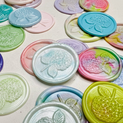 Hydrangea Bloom Wax Seal Stickers are embossed with a hydrangea bloom in various wax colors